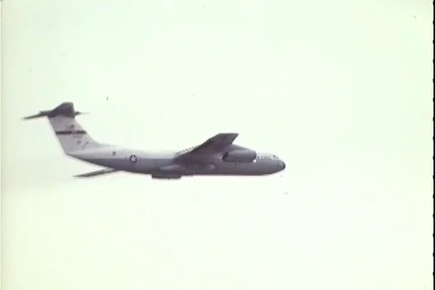 Lockheed C-130 Hercules takes off and in flight - 1977 Stock Footage 106060881
