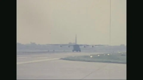 Lockheed C-130J Hercules takes off from U.S. Air Force station - 1967 Stock Footage 93002658
