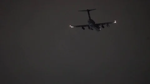 Lockheed C-5M Super Galaxy drops parachute packages 動画素材 113343689