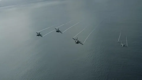 Lockheed Martin F-35 Lightning II aircrafts fly over Pacific Ocean - 2016 Stock Footage 88628153