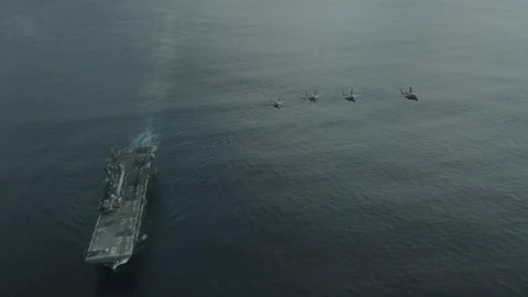 Lockheed Martin F-35 Lightning II aircrafts fly over Pacific Ocean - 2016 Stock Footage 88628200