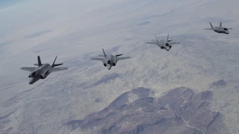 Lockheed Martin F-35 Lightning II flies mid-air in formation - 2016 Stock Footage 92047017
