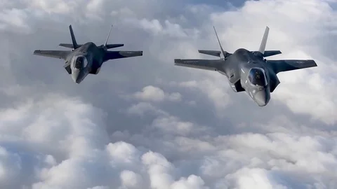 Lockheed Martin F-35 Lightning II Two planes fly each other Stock Footage 121797980