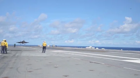 Lockheed Martin F-35 Lightning II Landing on an aircraft carrier Stock Footage 121798151
