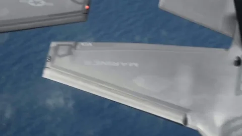 Lockheed Martin F-35 Lightning II aerobatics flying wing to wing Stock Footage 121798425