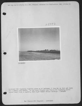 Lockheed P-38 Lightnings fighters queue u pat daybreak, 6 June 44, as they... Stock Photos