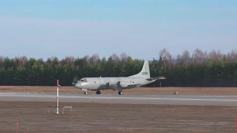 Lockheed P-3C Orion surveillance military aircraft line up runway Stock Footage 144101262