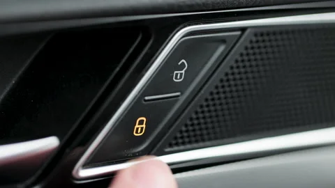 Locking and unlocking the doors of a car. Security for the car concept Stock Footage 194714338