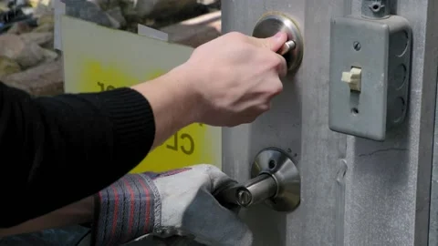 Locking Door With Zoom In For Emphasis Stock Footage 170386897