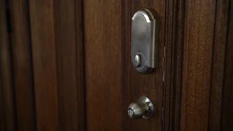 Locking the Front Door Video stock 169182511