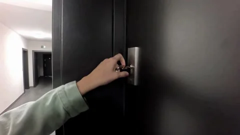 Locking the Front Door with a Key Stock Footage 253481581