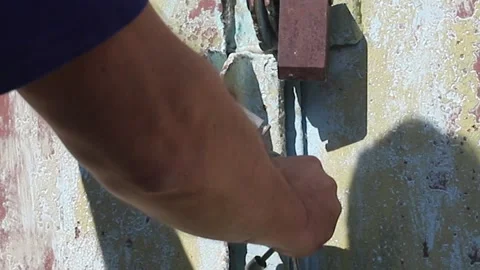 Locking Old Steel Padlock On Rusty Metal Door With Cracked  Paint Stock Footage 158928462