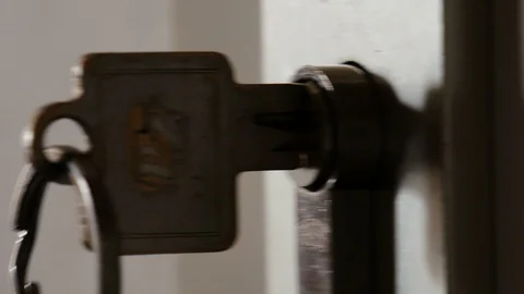 Locking up or unlocking a door Stock Footage 88388534
