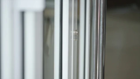 Locking up or unlocking door with key in hand Vídeos de archivo 71168493