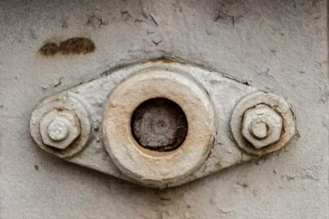 Locking piece with nuts close-up, background Stock Photos
