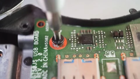 Locking the screw for mounting the computer board Stock Footage 165547922
