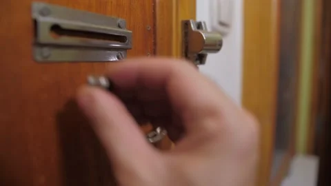 Locking security chain from door 4k Stock-Footage 144818488