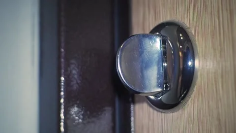 Locking, unlocking a deadbolt on a door. Stock Footage 96847237