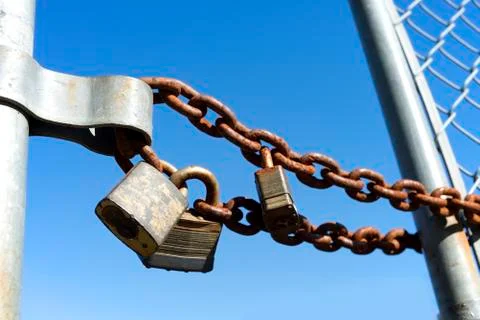 Locks and rusty chain, security 스톡 사진