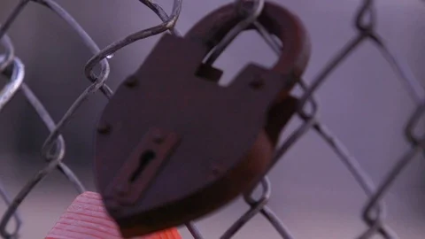 Locks on a fence Stock Footage 91362797