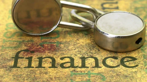 Locks on finance text dolly shot Stock Footage 224570128