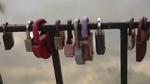 Locks hang on the bridge 스톡 동영상 78378131