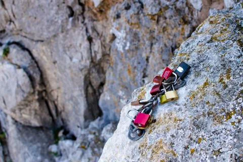 Locks locked to cliff Stock Photos