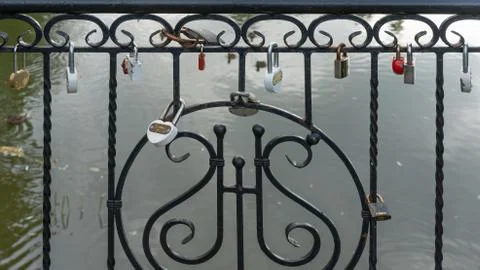 Locks of lovers on the bridge. Stock Photos