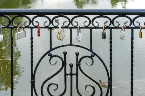 Locks of lovers on the bridge. Stock Photos