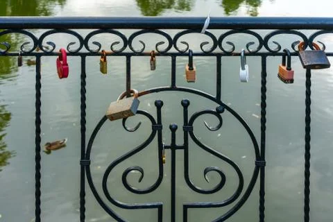 Locks of lovers on the bridge. Stock Photos