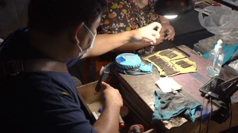 Locksmith Making Key Duplicate In Chiang Mai, Thailand. high angle Stock Footage 231848419