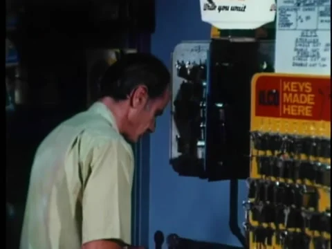 Locksmith making a key Stock Footage 260254267