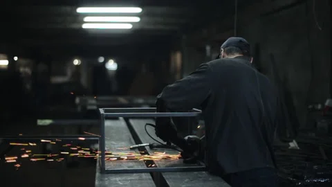 The locksmith metal works in the workshop disk grinding machine from which Stock Footage 135746741