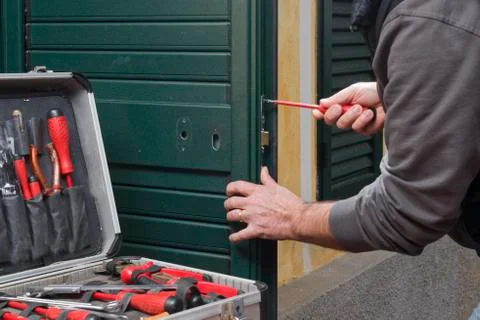 Locksmith repair the lock Stock Photos