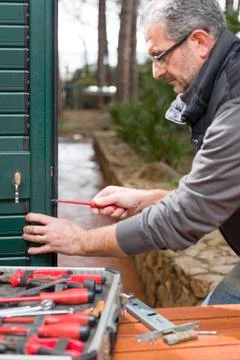 Locksmith repair the lock Stock Photos