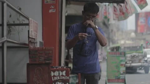 A Locksmith Working at His Stall in Sta. Mesa Manila Stock Footage 230088784