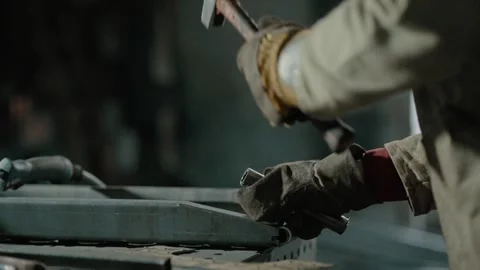 Locksmith works with a hammer. Video stock 342824281