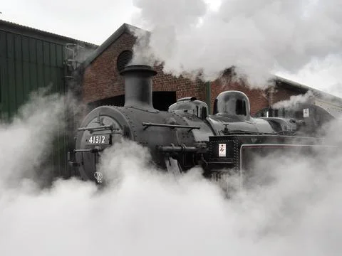 Loco enveloped in steam 스톡 사진