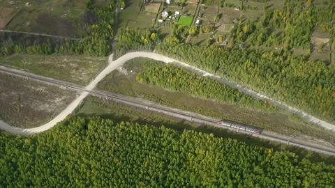 A locomotive is moving through the forest Stock Footage 101572779