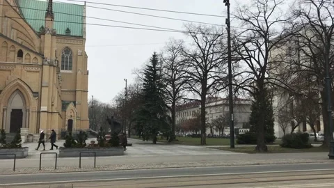 Lodz, Poland, A building with a clock on the side of a road Stock Footage 134341832