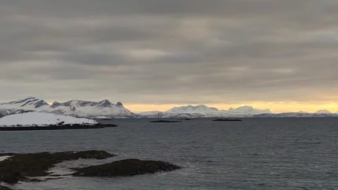 Lofoten Mountains below Colorful Dramatic Sky Stock Footage 265179261