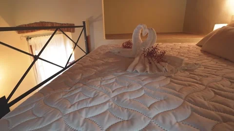 Loft bedroom interior in Tuscany bed and breakfast with rustic charm and wa.. Stock Footage 328973857
