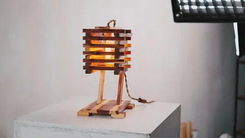 Loft cube wooden lamp on the table. 動画素材 127779509