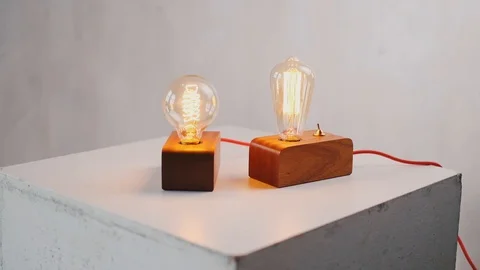 Loft cube wooden lamp on the table. Stock-Footage 127779521