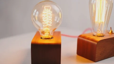Loft cube wooden lamp on the table. Stock Footage 127779531