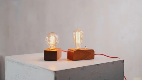 Loft cube wooden lamp on the table. Stock Footage 127779537