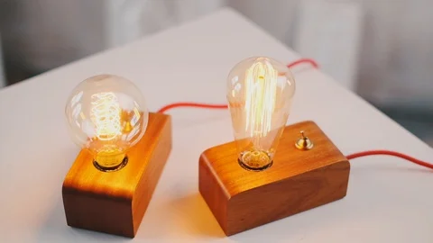 Loft cube wooden lamp on the table. Stock Footage 127779570