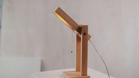 Loft cube wooden lamp on the table. Stock Footage 127779599