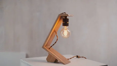 Loft cube wooden lamp on the table. Stock Footage 127779647