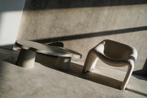 Loft interior design. Concrete table. Lights of a sun Stock Photos
